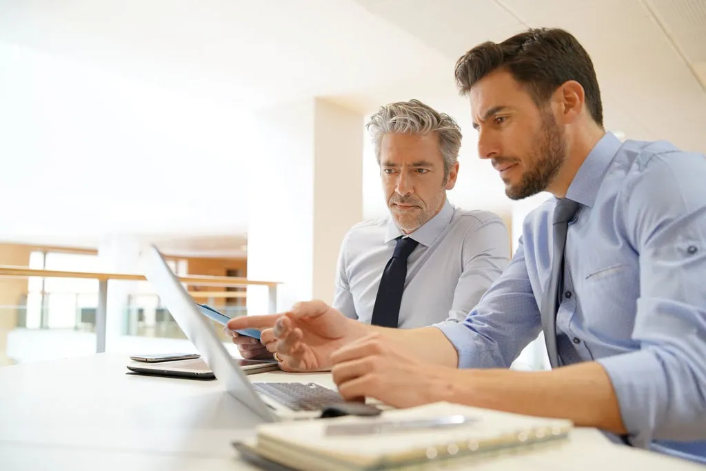 home buyer talking with a conveyancer after learning about conveyancing
