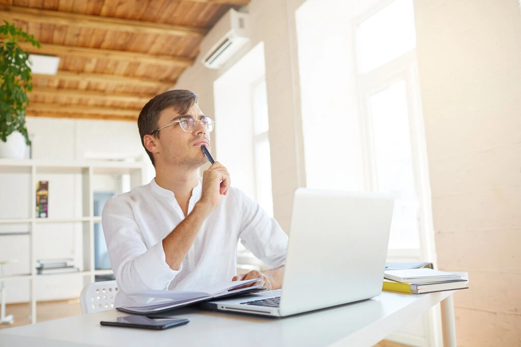 man thinking of answers to the question of how to pay off your home loan faster