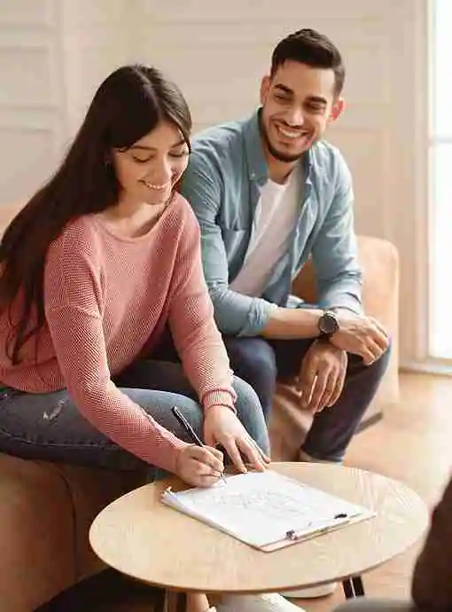 Couple meeting with a McDowall mortgage broker
